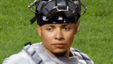 William Contreras in catcher’s mask and chest protector behind the plate